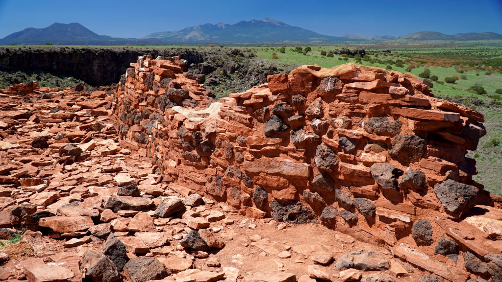 The Citadel Pueblo ruins, consisting of flat stone building blocks.